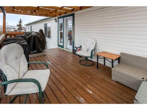 10 Downie Close, Carstairs, AB - Outdoor With Deck Patio Veranda With Exterior