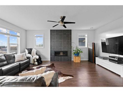 232 Sherwood Place Nw, Calgary, AB - Indoor Photo Showing Living Room With Fireplace