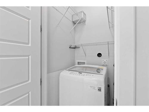 232 Sherwood Place Nw, Calgary, AB - Indoor Photo Showing Laundry Room