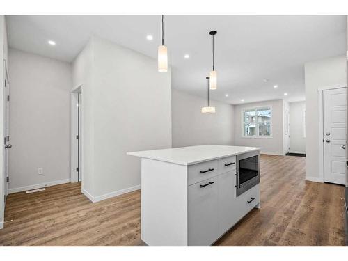 764 Creekside Boulevard Sw, Calgary, AB - Indoor Photo Showing Kitchen With Upgraded Kitchen