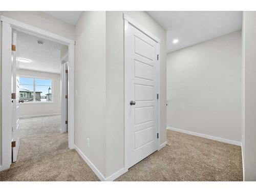 764 Creekside Boulevard Sw, Calgary, AB - Indoor Photo Showing Other Room