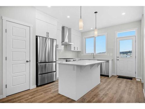 764 Creekside Boulevard Sw, Calgary, AB - Indoor Photo Showing Kitchen With Upgraded Kitchen