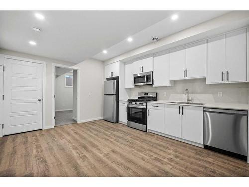 764 Creekside Boulevard Sw, Calgary, AB - Indoor Photo Showing Kitchen With Upgraded Kitchen