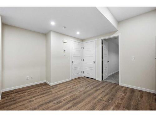 764 Creekside Boulevard Sw, Calgary, AB - Indoor Photo Showing Other Room