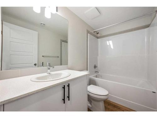 764 Creekside Boulevard Sw, Calgary, AB - Indoor Photo Showing Bathroom