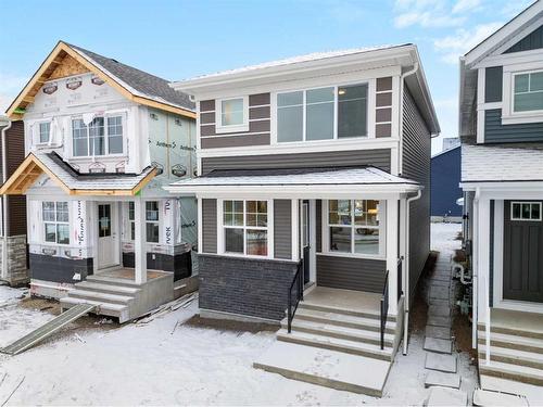 764 Creekside Boulevard Sw, Calgary, AB - Outdoor With Facade