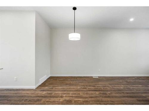 764 Creekside Boulevard Sw, Calgary, AB - Indoor Photo Showing Other Room