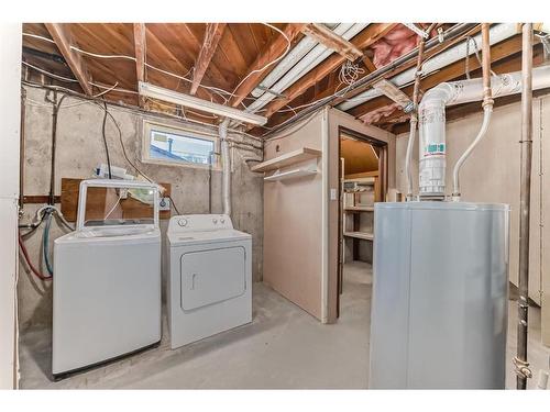 63 Fenton Road Se, Calgary, AB - Indoor Photo Showing Laundry Room