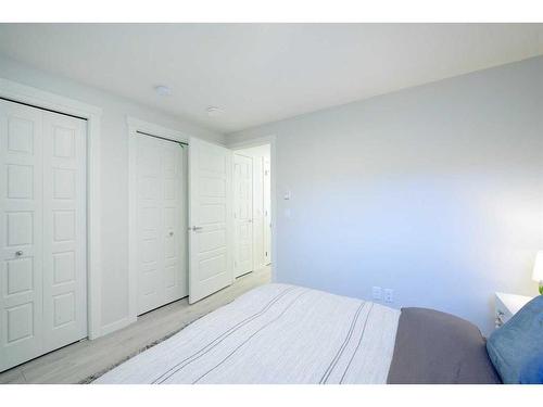 109-40 Livingston Parade Ne, Calgary, AB - Indoor Photo Showing Bedroom