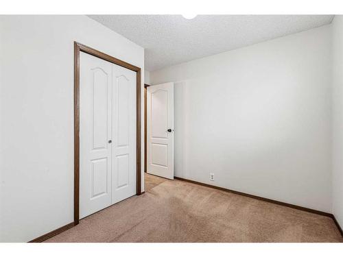 51 Sandstone Rise Nw, Calgary, AB - Indoor Photo Showing Other Room