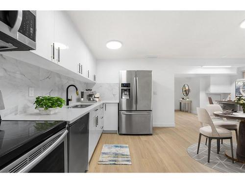 10816 Sacramento Drive Sw, Calgary, AB - Indoor Photo Showing Kitchen With Stainless Steel Kitchen