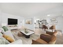 10816 Sacramento Drive Sw, Calgary, AB  - Indoor Photo Showing Living Room 