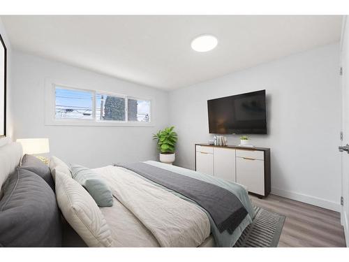 10816 Sacramento Drive Sw, Calgary, AB - Indoor Photo Showing Bedroom