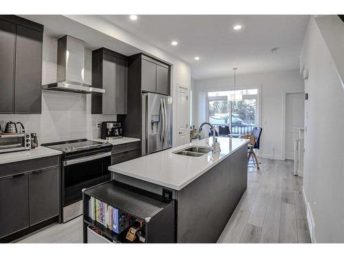 126-81 Greenbriar Place Nw, Calgary, AB - Indoor Photo Showing Kitchen With Stainless Steel Kitchen With Double Sink With Upgraded Kitchen