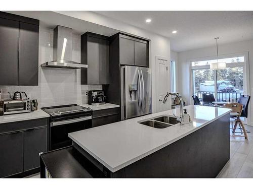 126-81 Greenbriar Place Nw, Calgary, AB - Indoor Photo Showing Kitchen With Stainless Steel Kitchen With Double Sink With Upgraded Kitchen