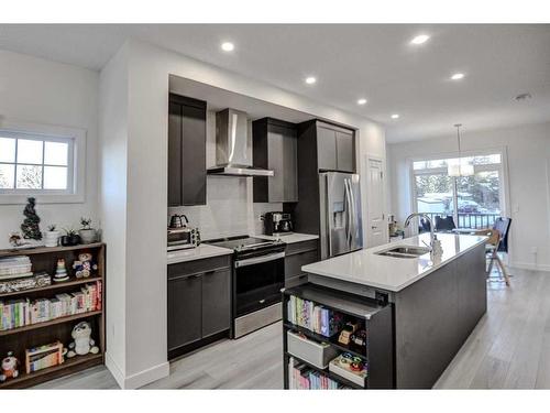 126-81 Greenbriar Place Nw, Calgary, AB - Indoor Photo Showing Kitchen With Double Sink With Upgraded Kitchen