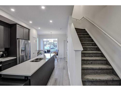 126-81 Greenbriar Place Nw, Calgary, AB - Indoor Photo Showing Kitchen With Double Sink With Upgraded Kitchen