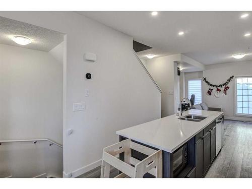 126-81 Greenbriar Place Nw, Calgary, AB - Indoor Photo Showing Kitchen With Double Sink