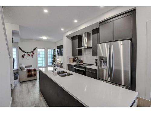 126-81 Greenbriar Place Nw, Calgary, AB - Indoor Photo Showing Kitchen With Stainless Steel Kitchen With Double Sink With Upgraded Kitchen