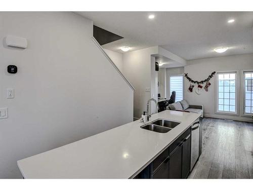 126-81 Greenbriar Place Nw, Calgary, AB - Indoor Photo Showing Kitchen With Double Sink