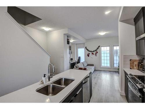 126-81 Greenbriar Place Nw, Calgary, AB - Indoor Photo Showing Kitchen With Double Sink