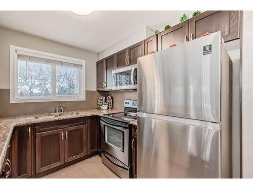 313-6315 Ranchview Drive Nw, Calgary, AB - Indoor Photo Showing Kitchen With Stainless Steel Kitchen