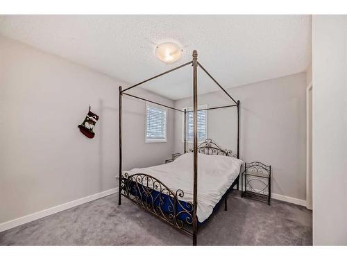 2435 Morris Crescent Se, Airdrie, AB - Indoor Photo Showing Bedroom