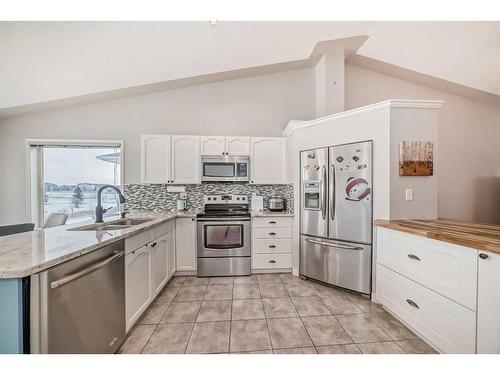 2435 Morris Crescent Se, Airdrie, AB - Indoor Photo Showing Kitchen With Double Sink