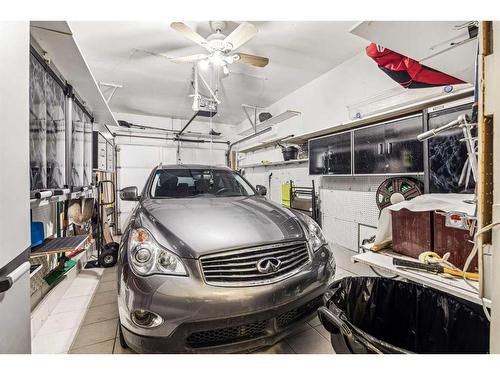 54 Rivercrest Villas Se, Calgary, AB - Indoor Photo Showing Garage