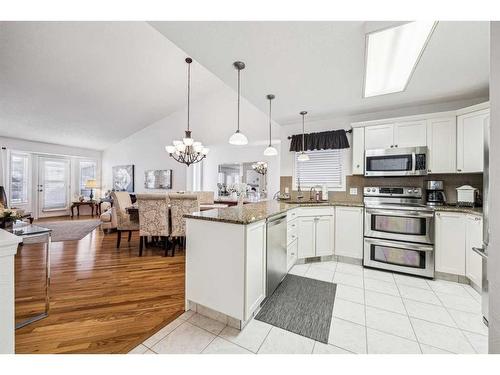 54 Rivercrest Villas Se, Calgary, AB - Indoor Photo Showing Kitchen With Upgraded Kitchen