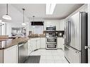 54 Rivercrest Villas Se, Calgary, AB  - Indoor Photo Showing Kitchen With Upgraded Kitchen 