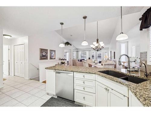 54 Rivercrest Villas Se, Calgary, AB - Indoor Photo Showing Kitchen With Double Sink With Upgraded Kitchen