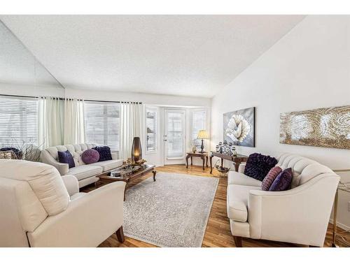 54 Rivercrest Villas Se, Calgary, AB - Indoor Photo Showing Living Room