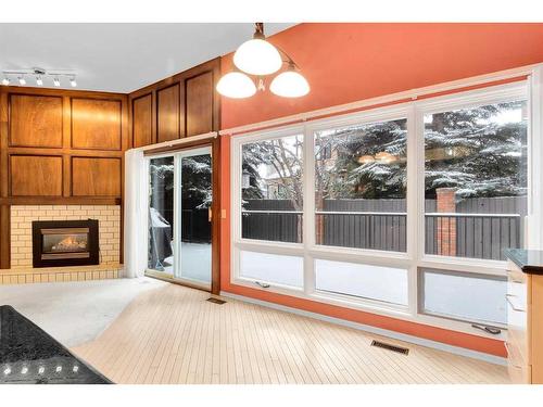 5-35 Oakmount Court Sw, Calgary, AB - Indoor With Fireplace