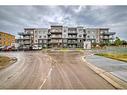 112-150 Shawnee Square Sw, Calgary, AB  - Outdoor With Facade 