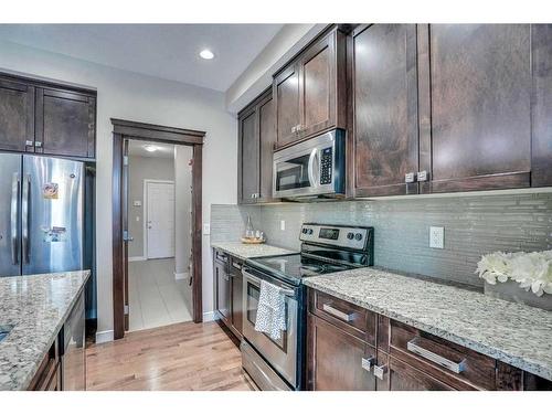 54 Redstone Mews Ne, Calgary, AB - Indoor Photo Showing Kitchen With Stainless Steel Kitchen With Upgraded Kitchen