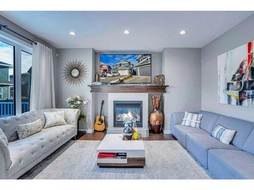 54 Redstone Mews Ne, Calgary, AB - Indoor Photo Showing Living Room With Fireplace