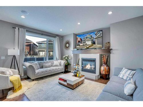 54 Redstone Mews Ne, Calgary, AB - Indoor Photo Showing Living Room With Fireplace