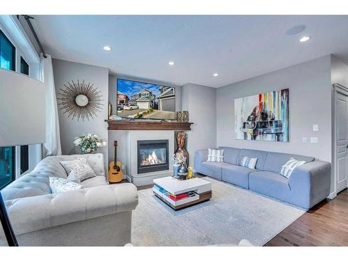 54 Redstone Mews Ne, Calgary, AB - Indoor Photo Showing Living Room With Fireplace