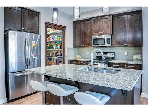 54 Redstone Mews Ne, Calgary, AB - Indoor Photo Showing Kitchen With Stainless Steel Kitchen With Double Sink With Upgraded Kitchen