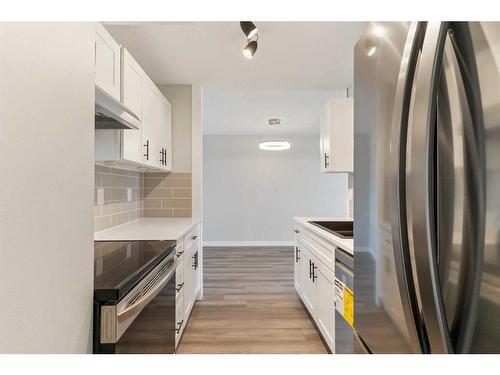 514-9800 Horton Road Sw, Calgary, AB - Indoor Photo Showing Kitchen With Stainless Steel Kitchen With Upgraded Kitchen