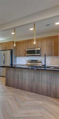 6 Cobbleridge Place, Airdrie, AB - Indoor Photo Showing Kitchen