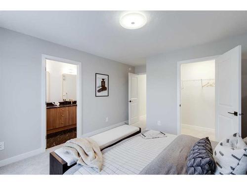 104 Sundown Crescent, Cochrane, AB - Indoor Photo Showing Bedroom