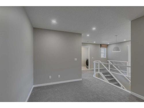 180 Magnolia Terrace Se, Calgary, AB - Indoor Photo Showing Other Room