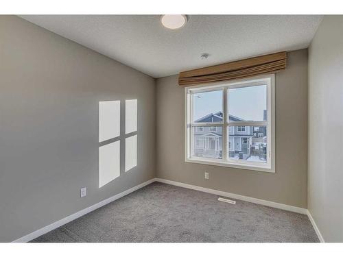 180 Magnolia Terrace Se, Calgary, AB - Indoor Photo Showing Other Room