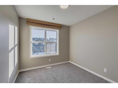 180 Magnolia Terrace Se, Calgary, AB - Indoor Photo Showing Other Room