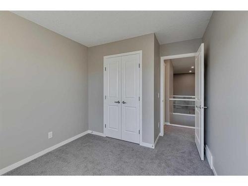 180 Magnolia Terrace Se, Calgary, AB - Indoor Photo Showing Other Room