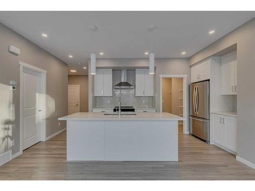 180 Magnolia Terrace Se, Calgary, AB - Indoor Photo Showing Kitchen With Stainless Steel Kitchen With Upgraded Kitchen