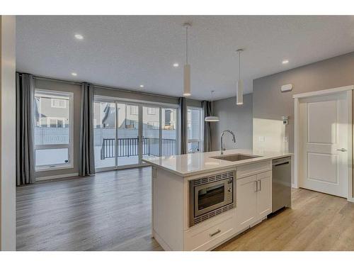 180 Magnolia Terrace Se, Calgary, AB - Indoor Photo Showing Kitchen With Upgraded Kitchen