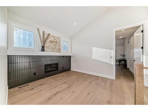 2812A 40 Street Sw, Calgary, AB - Indoor With Fireplace